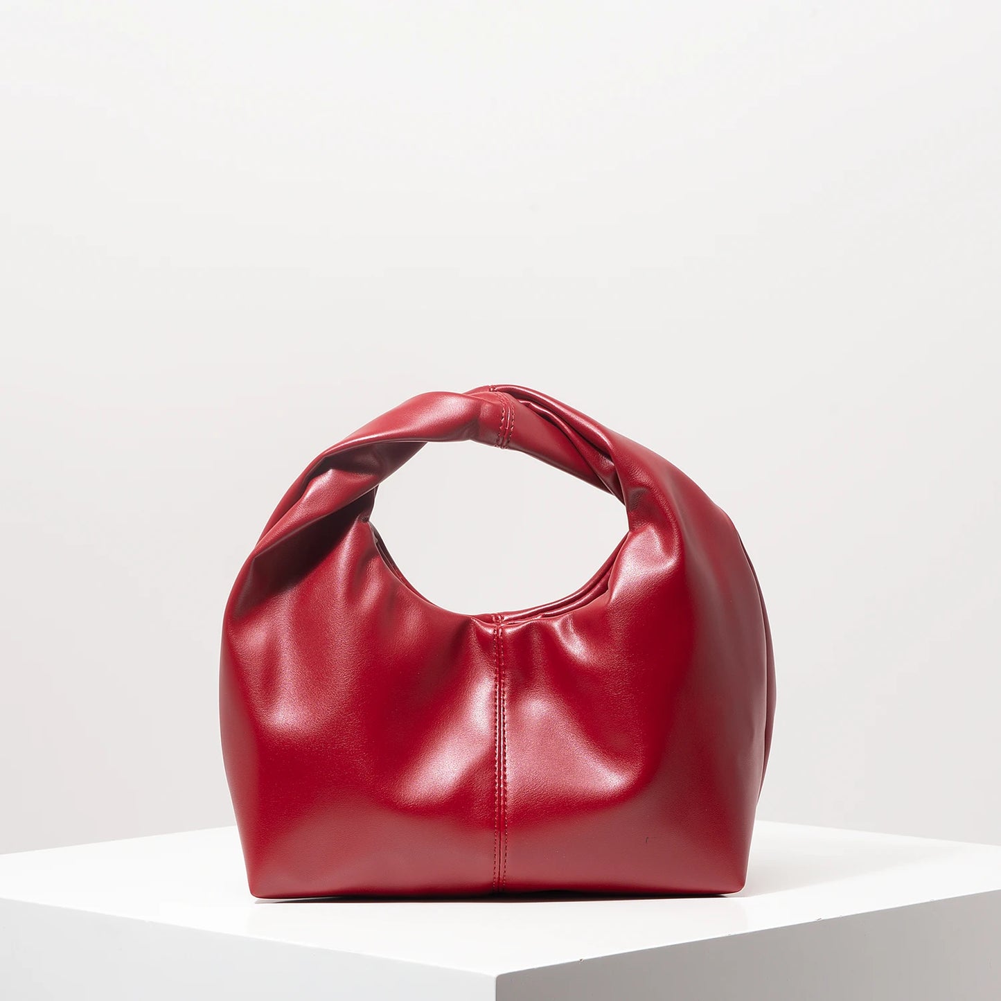 Stylish twist square bag, solid color top clutch bag, simple and versatile commut