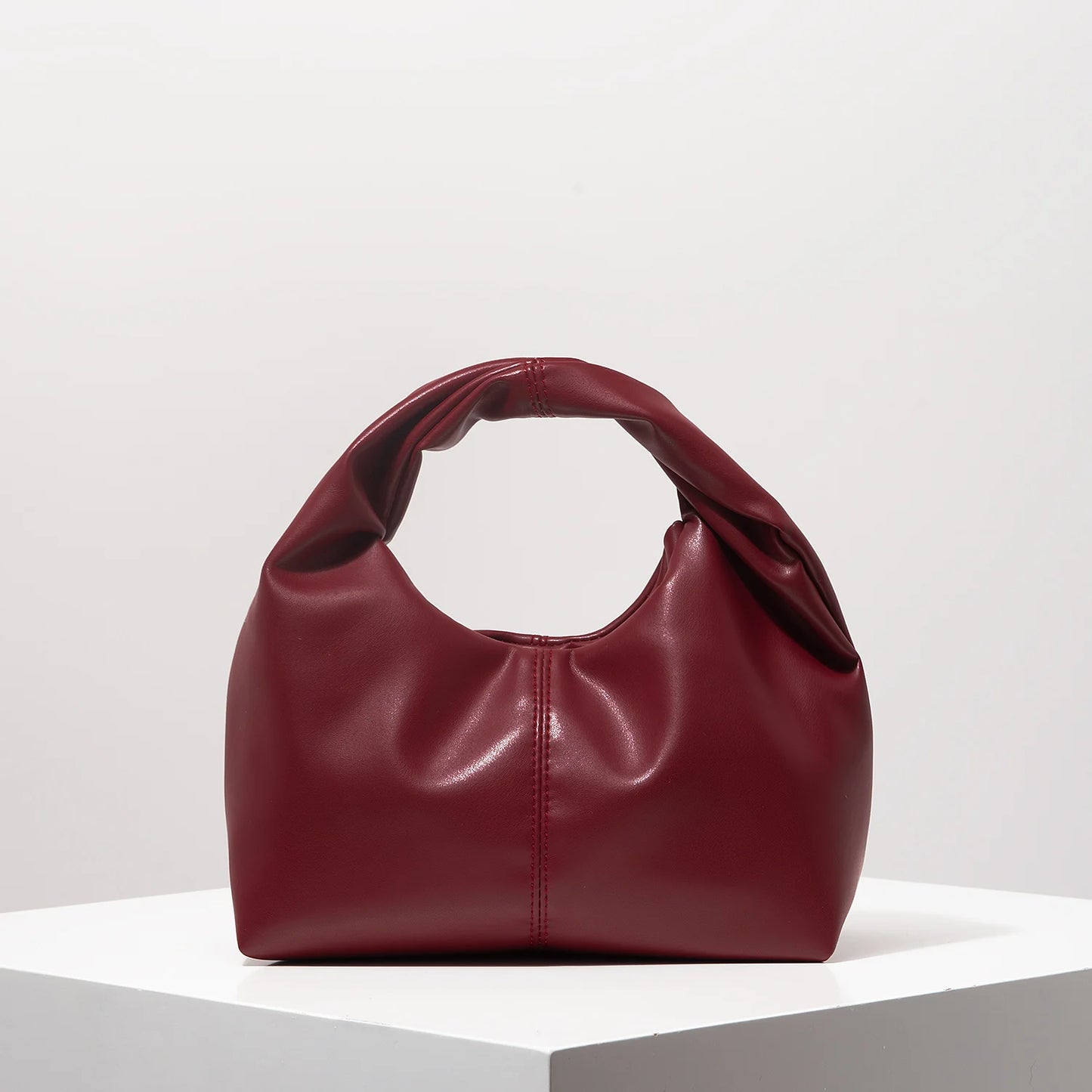 Stylish twist square bag, solid color top clutch bag, simple and versatile commut