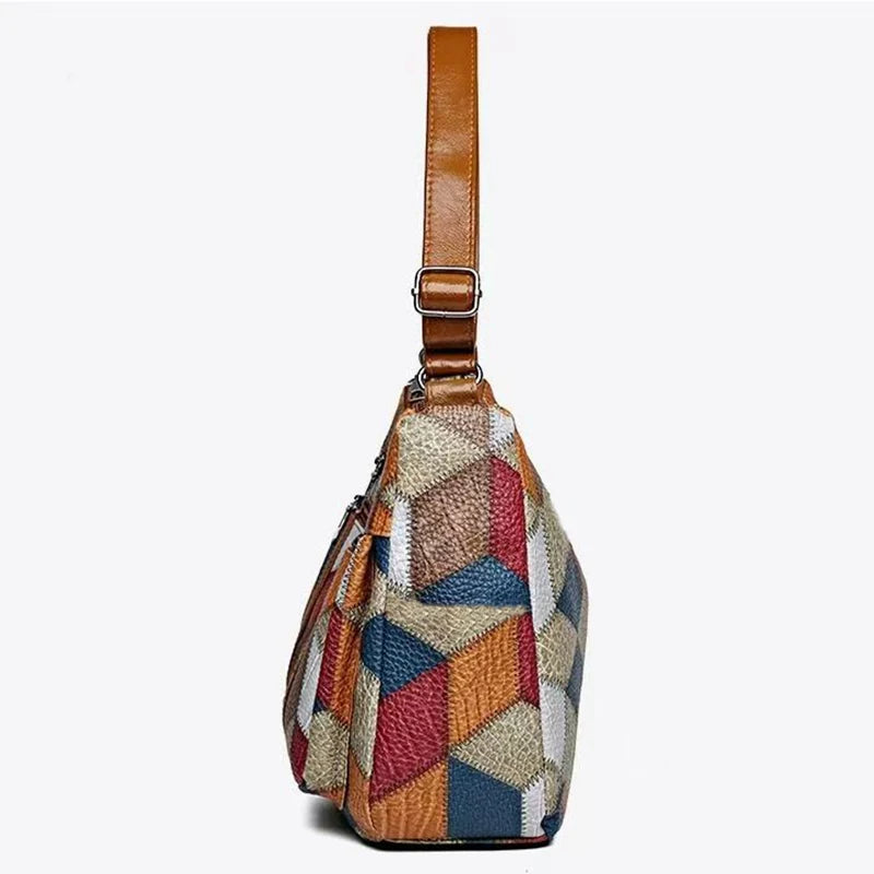 Lady's mother bag with geometric pattern design, suitable for traveling and shopping. Made of PU material.