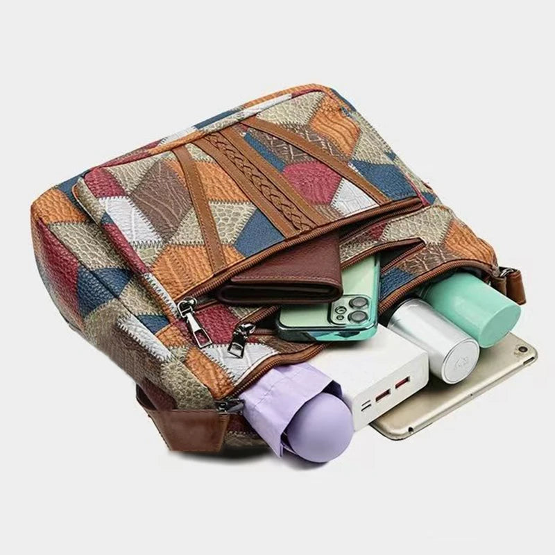 Lady's mother bag with geometric pattern design, suitable for traveling and shopping. Made of PU material.