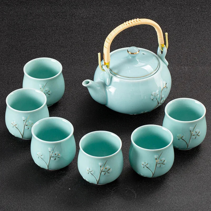 White Porcelain Gilded Relief Plum Blossom Teaware Sets Ceramic Large Lifting Beam Teapot and Tea Cup