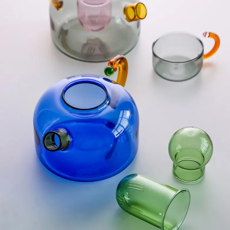 Kontrasterende farge te potte fargerik glass te vann separasjon filtrering tekanne te kopp sett kreativ drikkevare teakettle