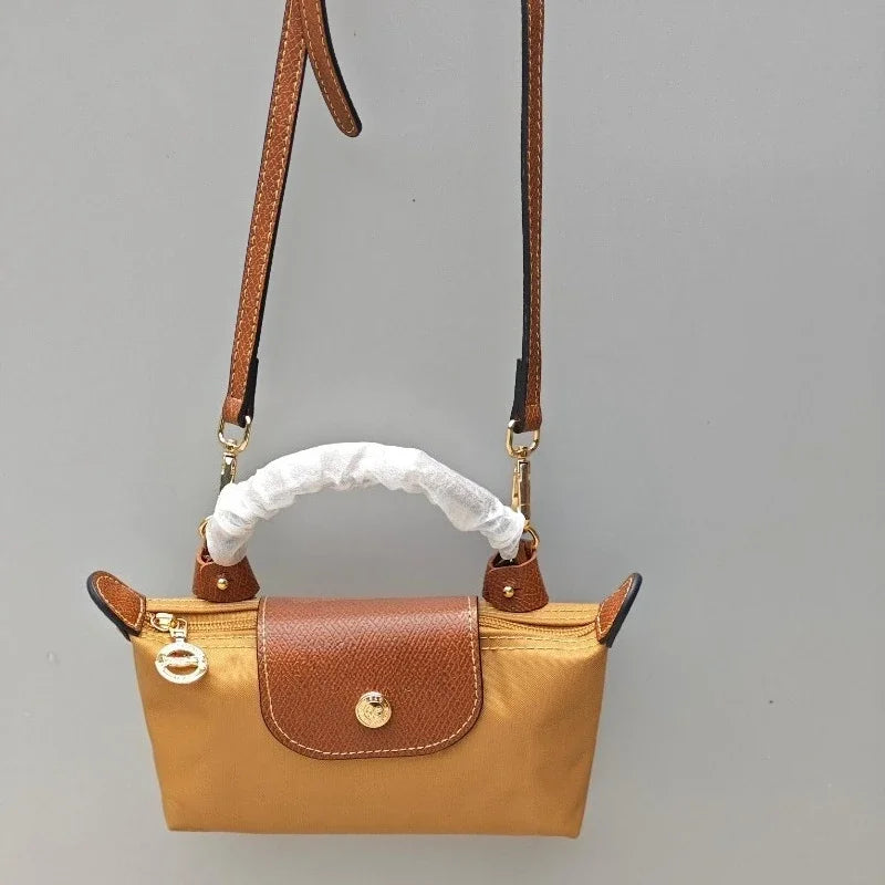 25 Mini Nylon Dumpling Bun Non Perforated Single Shoulder Women's Handbag Multi functional Spring and Autumn Single Shoulder Bun