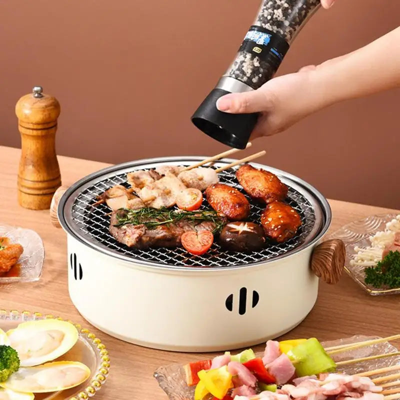 Pārnēsājams bārbekjū grils korejiešu kokogļu plīts nerūsējošā tērauda sadalīta BBQ plīts apaļš nelipīgs bārbekjū plaukts āra kempingam