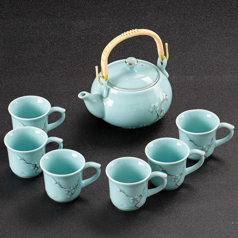 White Porcelain Gilded Relief Plum Blossom Teaware Sets Ceramic Large Lifting Beam Teapot and Tea Cup