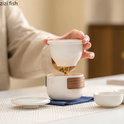 Service à thé de voyage en plein air, service à thé Kung Fu en céramique, service à thé Portable, théière, tasse à thé, infuseur d'eau, séparateur d'eau, Pot filtrant