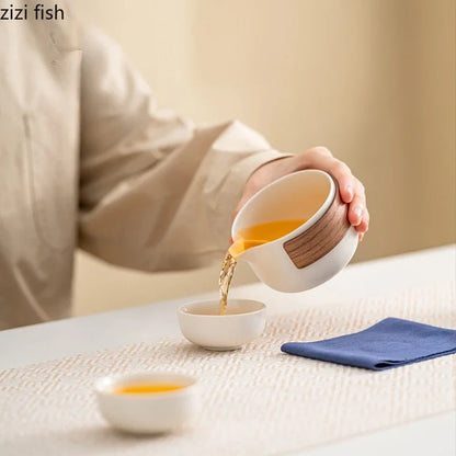 Service à thé de voyage en plein air, service à thé Kung Fu en céramique, service à thé Portable, théière, tasse à thé, infuseur d'eau, séparateur d'eau, Pot filtrant