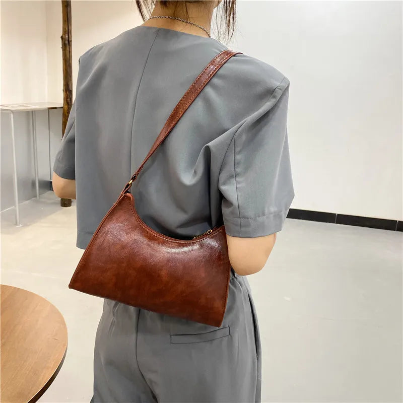 Moda Exquisita bolso de compras Retro Totos de mujer Retro Mujeres de hombro Femenino de cuero Sólido Bolsos de color de color para mujeres 2021