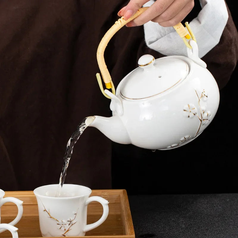 White Porcelain Gilded Relief Plum Blossom Teaware Sets Ceramic Large Lifting Beam Teapot and Tea Cup