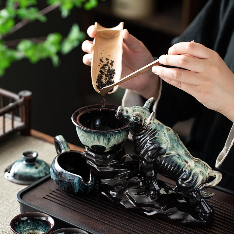 1 set of creative lazy tea set, semi-automatic cow teapot, magnetic rotating water guide, Chinese Kung Fu tea set