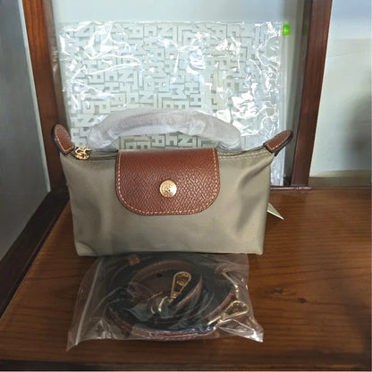 25 Mini Nylon Dumpling Bun Non Perforated Single Shoulder Women's Handbag Multi functional Spring and Autumn Single Shoulder Bun