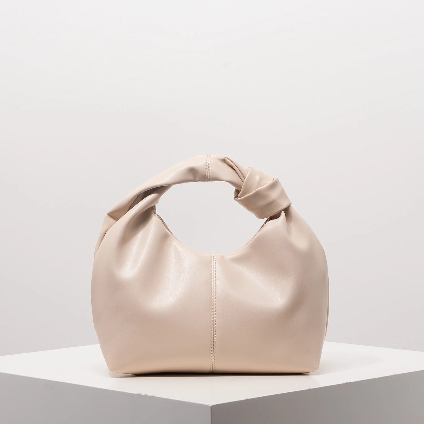 Stylish twist square bag, solid color top clutch bag, simple and versatile commut