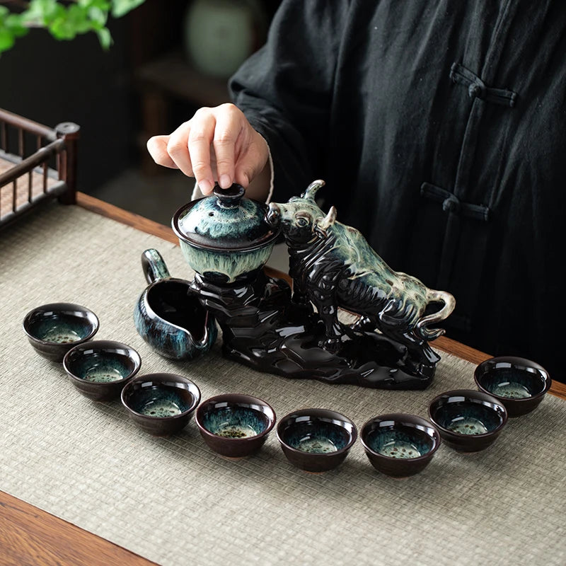 1 set of creative lazy tea set, semi-automatic cow teapot, magnetic rotating water guide, Chinese Kung Fu tea set
