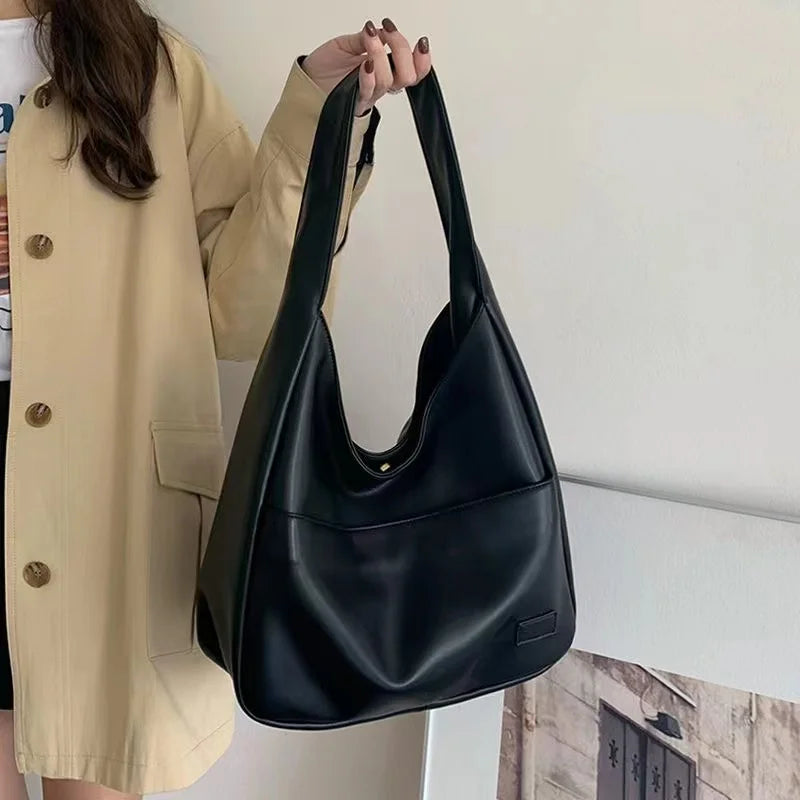 Sac fourre-tout de grande capacité Nouveau sac d'épaule à tendance pour femmes Sac de banlieue simple et polyvalent sac à la mode de classe